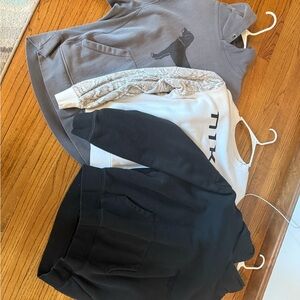 Black dog sweatshirt and Nike sweatshirt